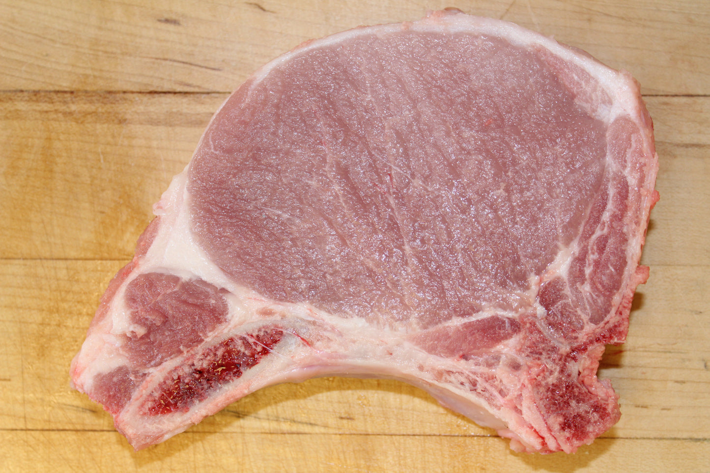 The Rittenhouse Pork Chop 2 1/4" Thick Cut Pork Loin Rib Chop